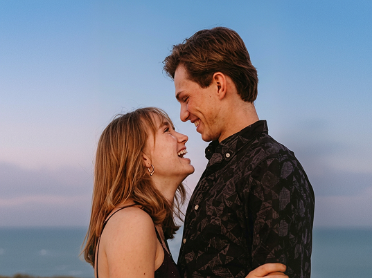 couple-embracing-golden-hour-beach