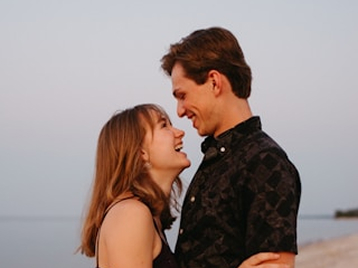couple-embracing-golden-hour-beach
